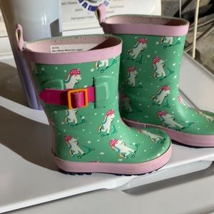 New rain boots worn once.